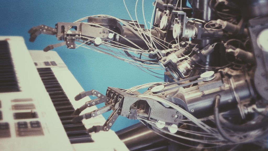 The robot playing piano - photo by Possessed Photography on Unsplash